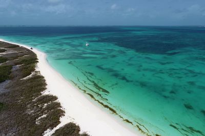 Drone view of beach with clear water in los roques, caribbean sea, venezuela