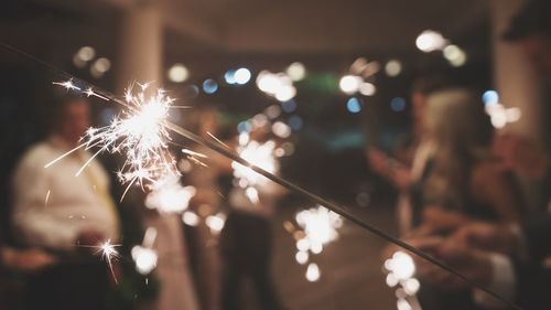 Close-up of firework display at night