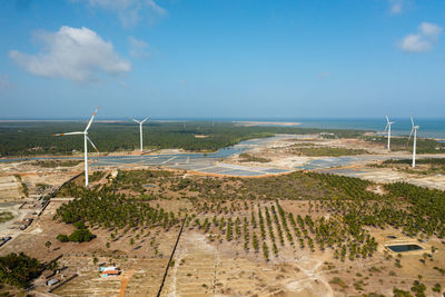 Wind turbines for electric power production on the seashore. wind power plant. ecological landscape.