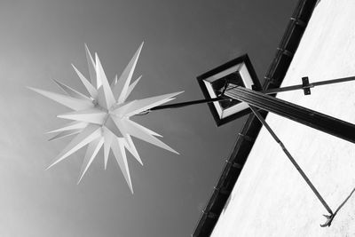 Low angle view of windmill