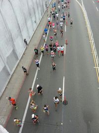 High angle view of people on road