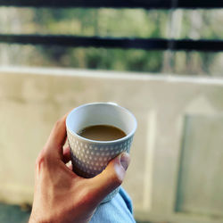 Close-up of coffee cup on table