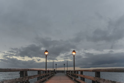 Long jetty leading to calm sea