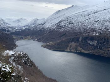 View of snowcapped mountains around fjord