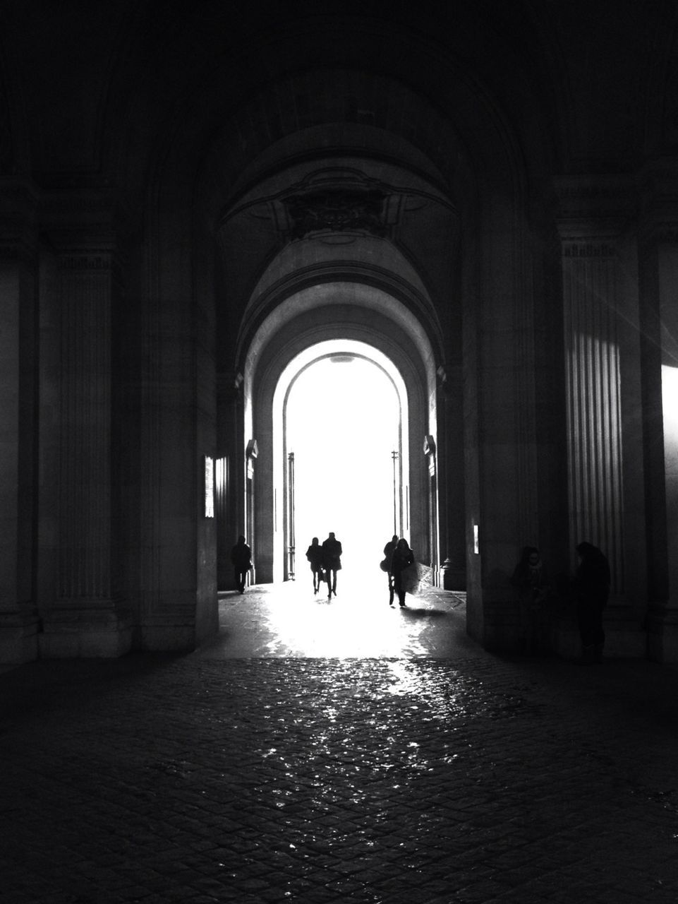 arch, architecture, built structure, indoors, silhouette, architectural column, walking, men, full length, corridor, column, person, colonnade, archway, the way forward, lifestyles, arched, unrecognizable person, day