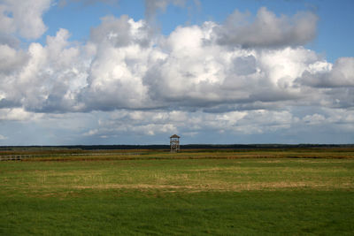 Scenic view of land against sky