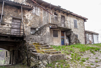 Low angle view of old building against sky