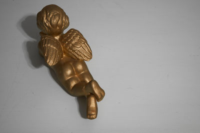 High angle view of candles on table against white background