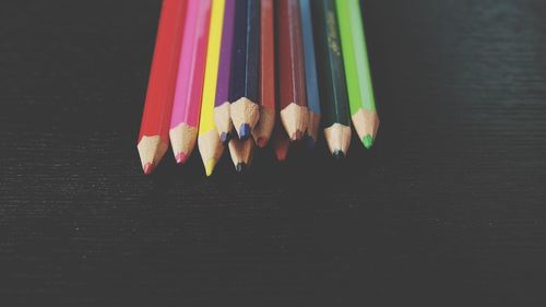 High angle view of multi colored pencils on table