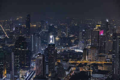 Aerial view of modern cityscape at night