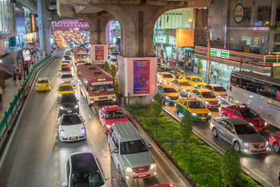 High angle view of traffic in illuminated city at night