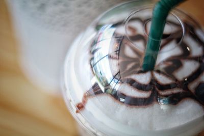 Close-up of iced coffee on table