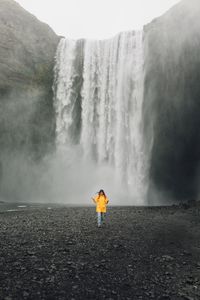 Scenic view of waterfall on landscape