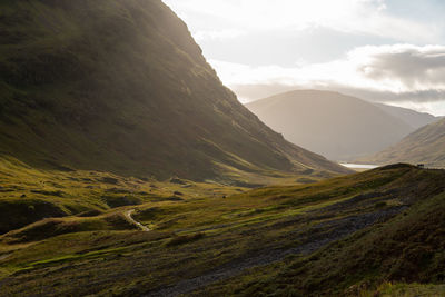 Glen coe valley landscape at sunset in the scottish highlands