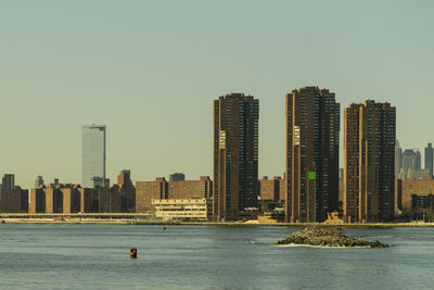 Manhattan skyline, waterside plaza condos from east side manhattan, panorama, river, architecture