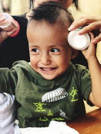 Close-up portrait of smiling boy