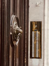 Close-up of door knocker on building