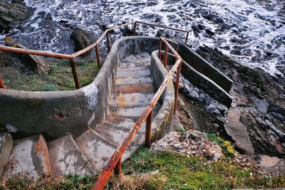 High angle view of water flowing through rocks