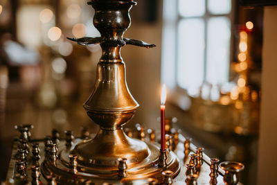 Close-up of chess pieces on table