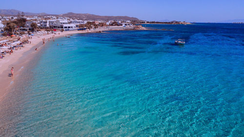 Scenic view of sea against blue sky