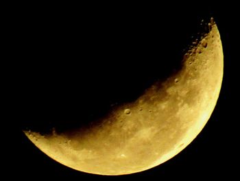 Close-up of moon over black background