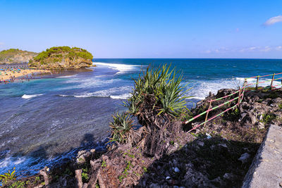 Scenic view of sea against clear sky