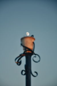 Low angle view of street light against clear sky