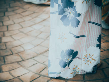 High angle view of white flower on floor