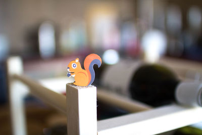 Close-up of stuffed toy on wood