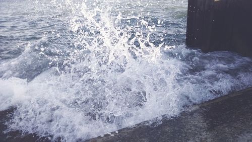 Waves splashing on rocks