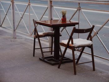 Empty table near the road at the street cafe