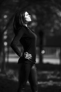 Midsection of woman looking away