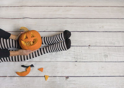 High angle view of pumpkin on wooden table