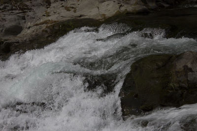 Waves splashing on rocks