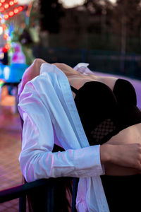 Midsection of woman wearing mask