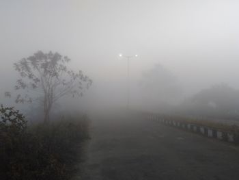 Scenic view of landscape against sky at morning