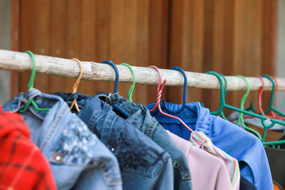 Clothes hanging on rack at store