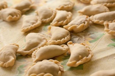 Close-up of raw dumplings on table