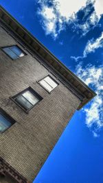 Low angle view of built structure against blue sky