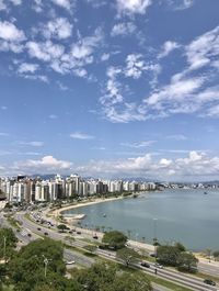 High angle view of bridge and buildings against sky