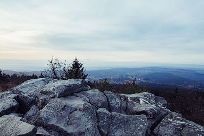 Scenic view of rocks against sky