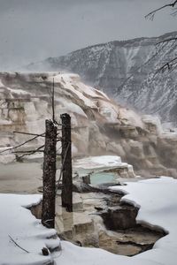 Scenic view of snow covered mountains