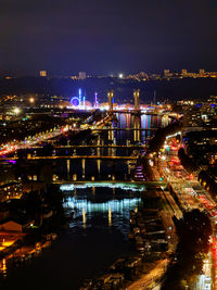 High angle view of illuminated city at night