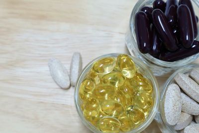 High angle view of fruits in jar on table