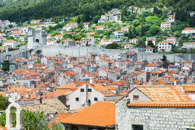 High angle view of houses in city