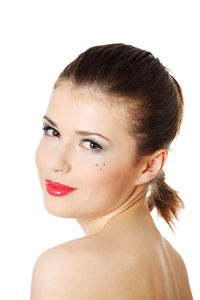 Close-up portrait of a young woman over white background