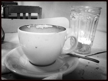 Close-up of coffee cup on table