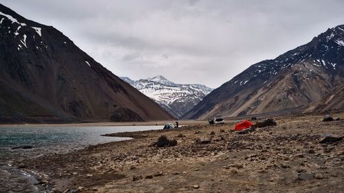 Scenic view of mountains against cloudy sky