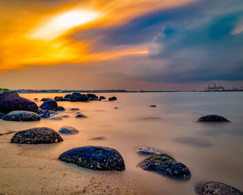 Scenic view of sea against sky during sunset