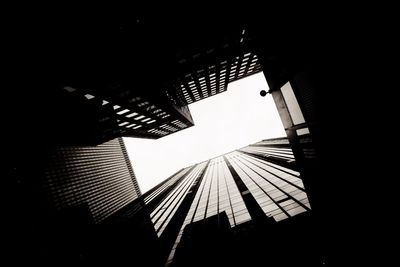 Low angle view of skyscrapers against sky